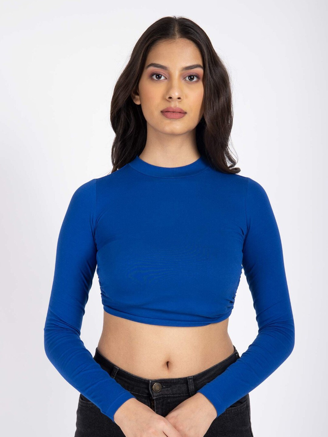 

Bonkers Corner Blue High Neck Full Sleeves Cotton Styled Back Crop Top