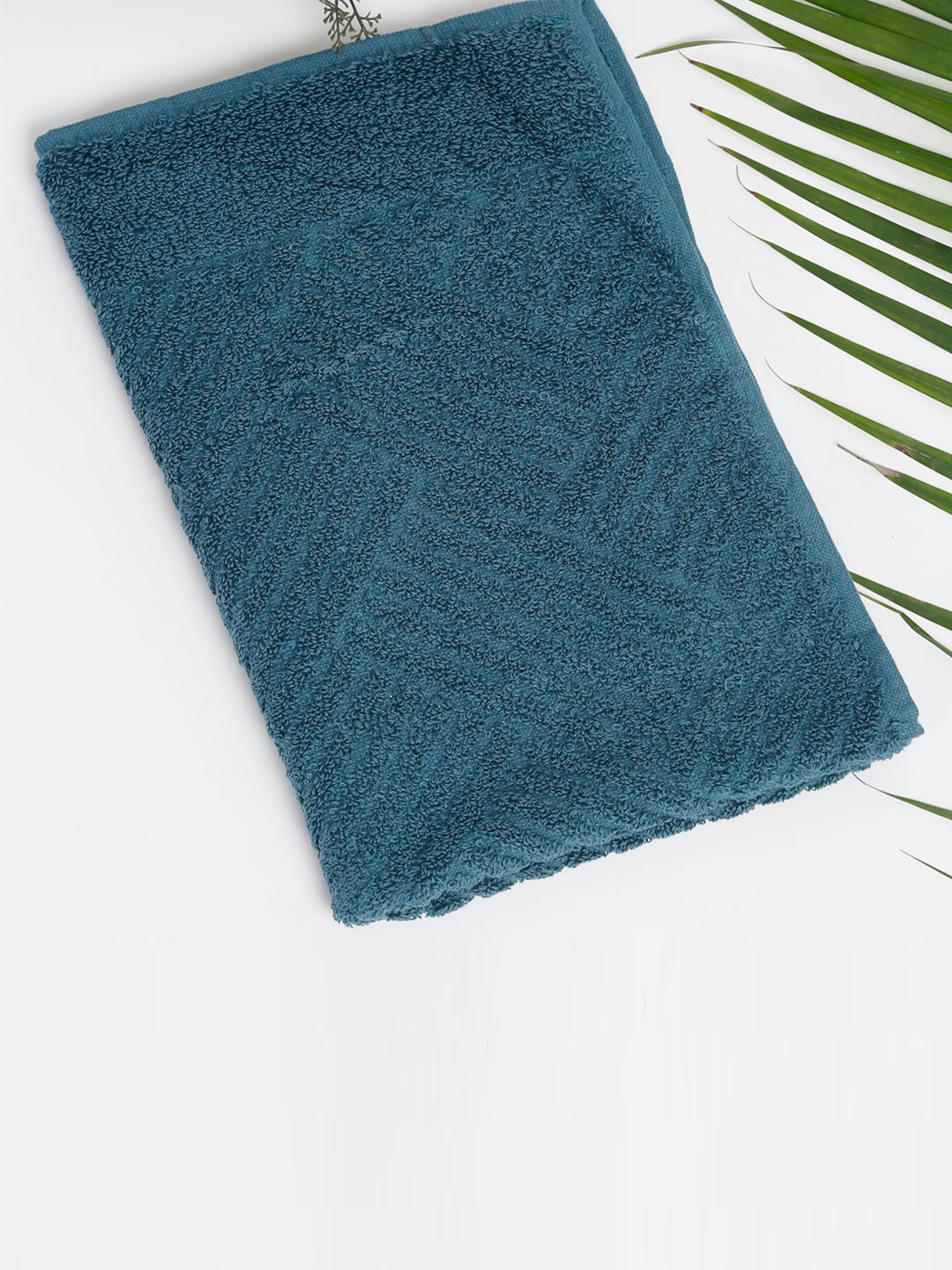 

Fabindia Teal Textured 500 GSM Cotton Face Towel
