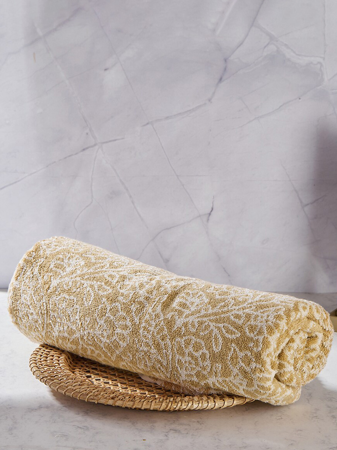 

Fabindia Beige & White Floral Self Design 550 GSM Cotton Bath Towel