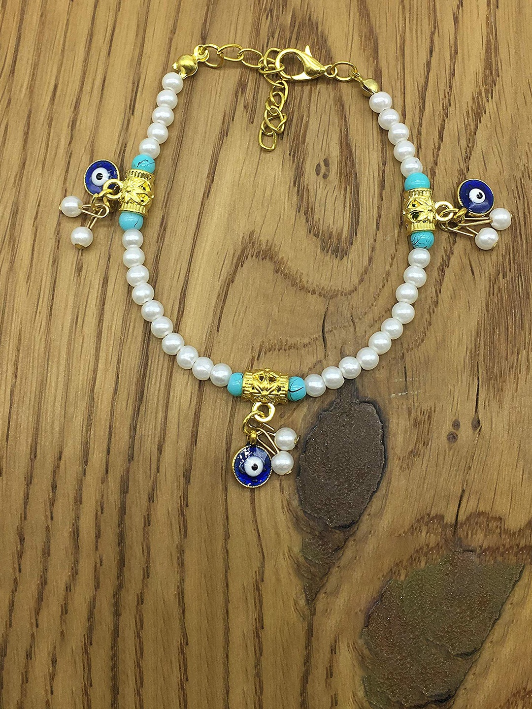 

Digital Dress Room Evil Eye Rakhi Pearls Bracelet With Latkan, White