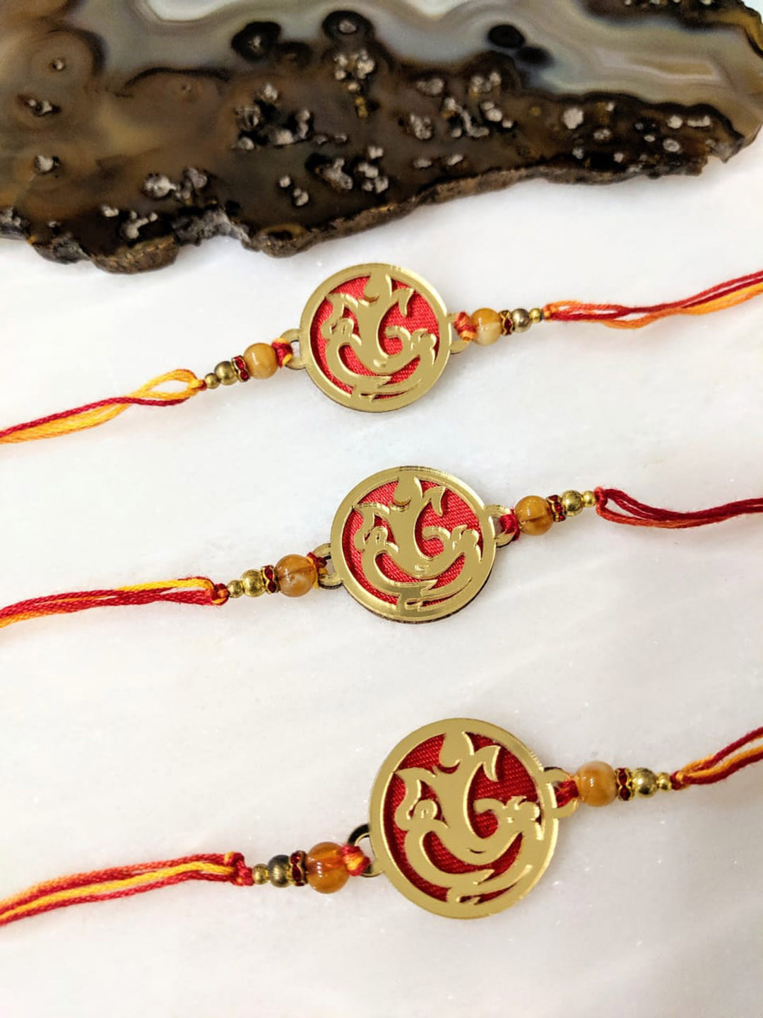 

Digital Dress Room Set Of 3 Gold-Plated Ganesh Ji Rakhi
