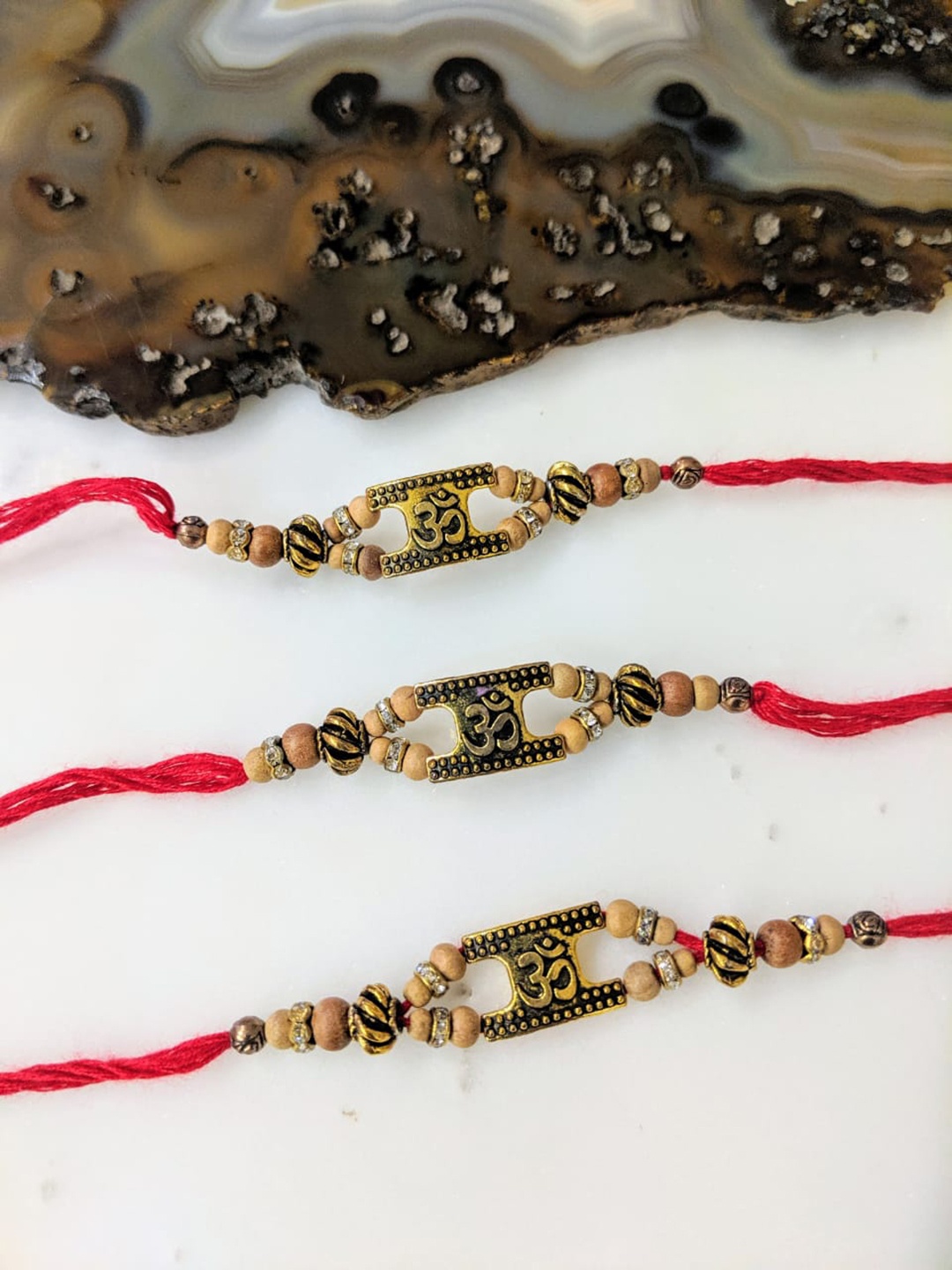 

Digital Dress Room Men Set Of 3 Gold Plated Om Beads Rakhi