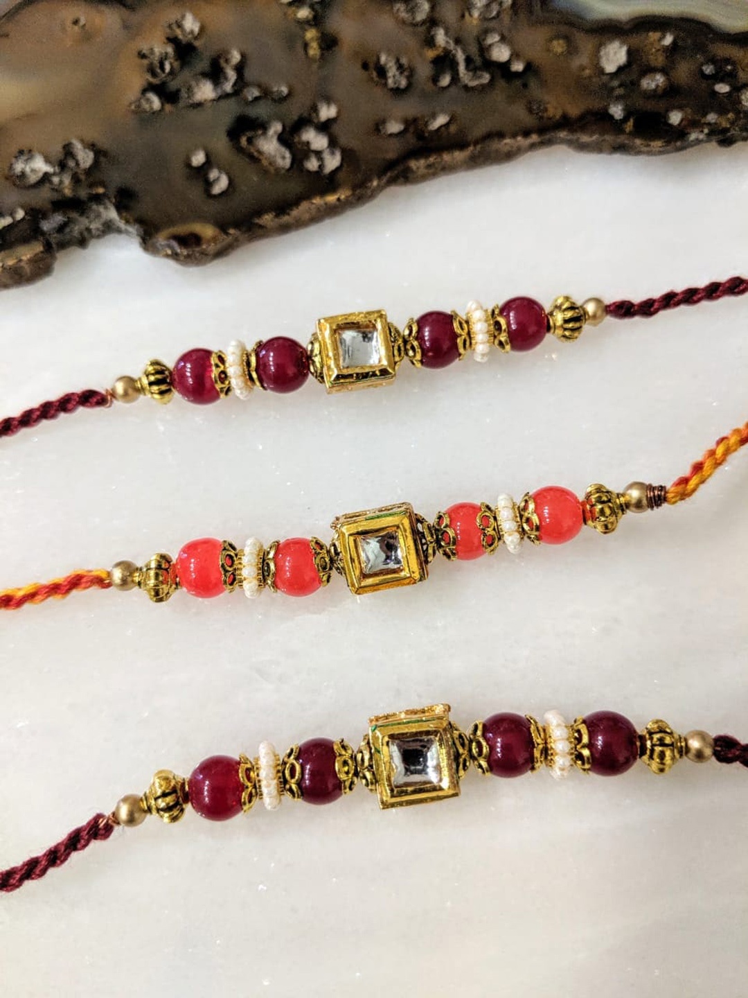 

Digital Dress Room Set Of 3 Kundan Stone Bead Wrist Thread Band Bracelet, Gold