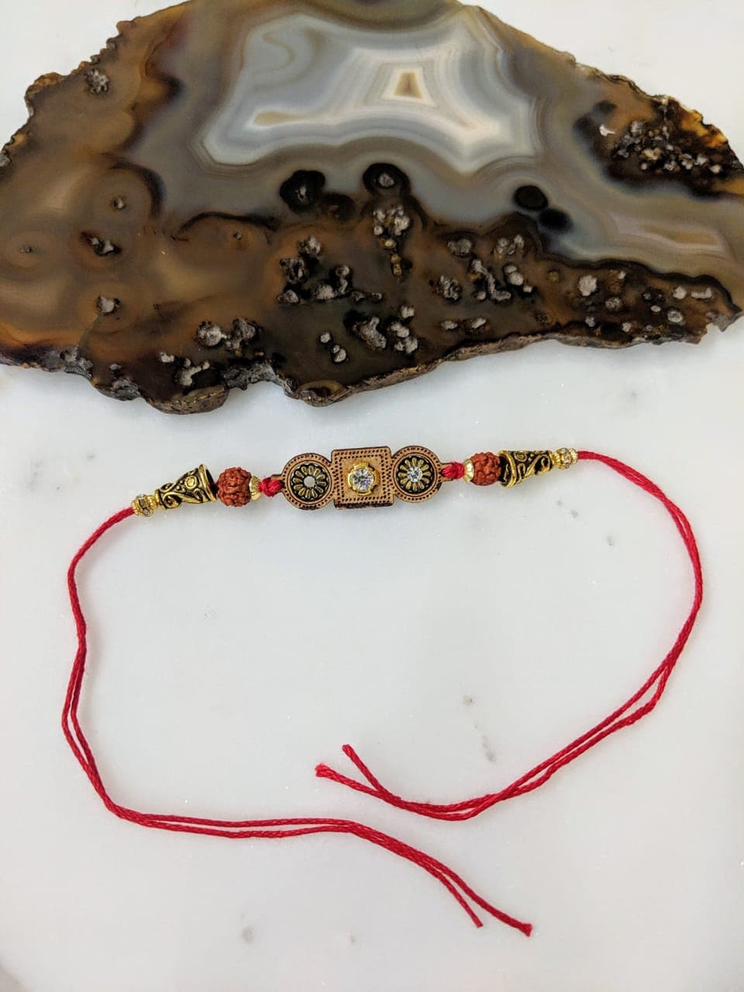 

Digital Dress Men Stone Studded Rudraksh Rakhi, Gold