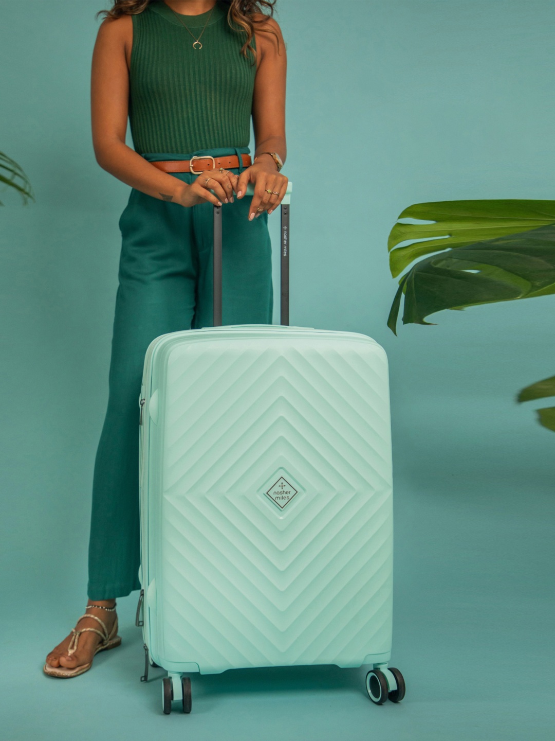 

Nasher Miles Hard-Sided Medium Textured TrolleySuitcase, Blue