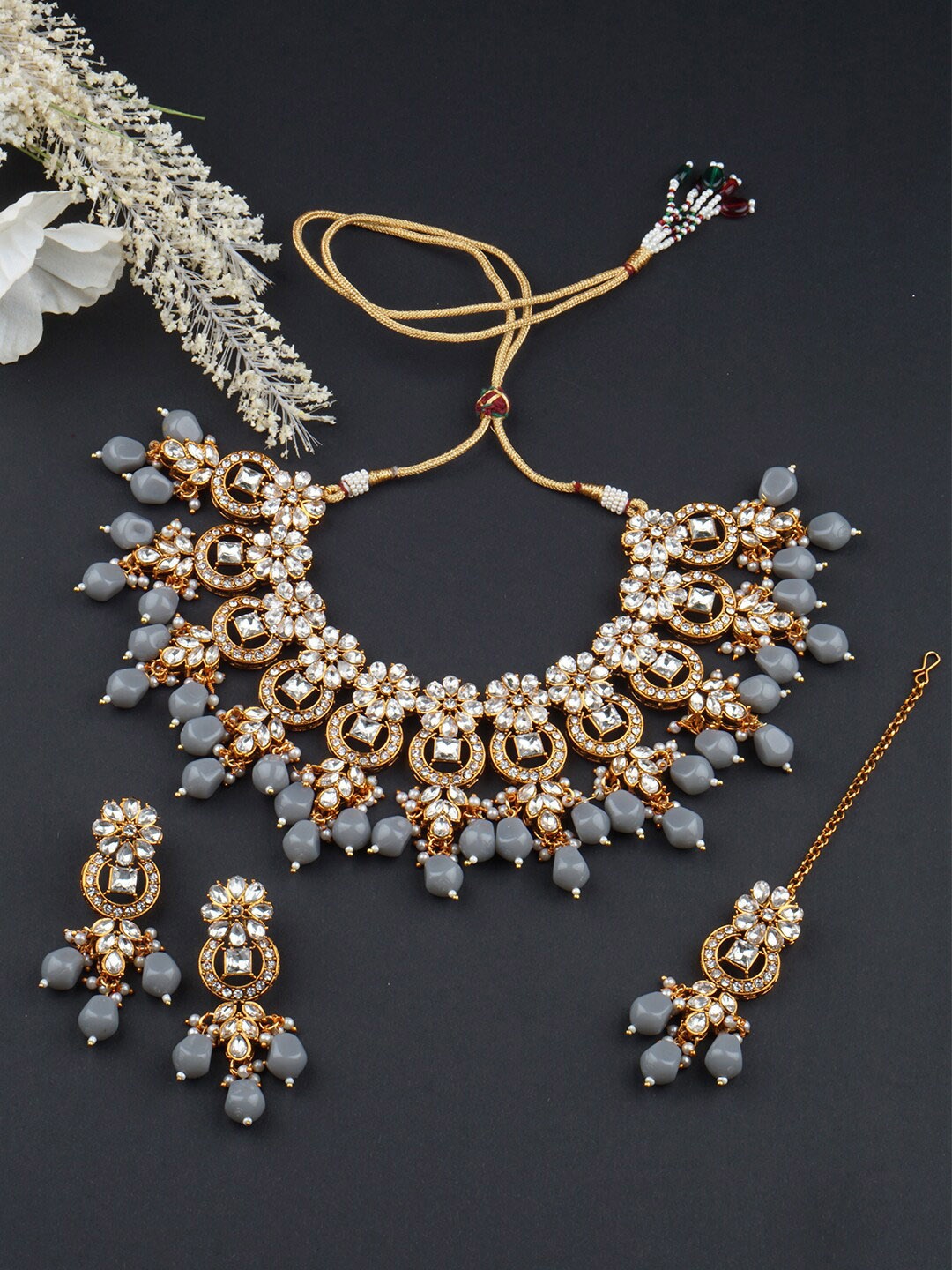 

Matushri Art Gold-Plated Stone-Studded & Beaded Jewellery Set