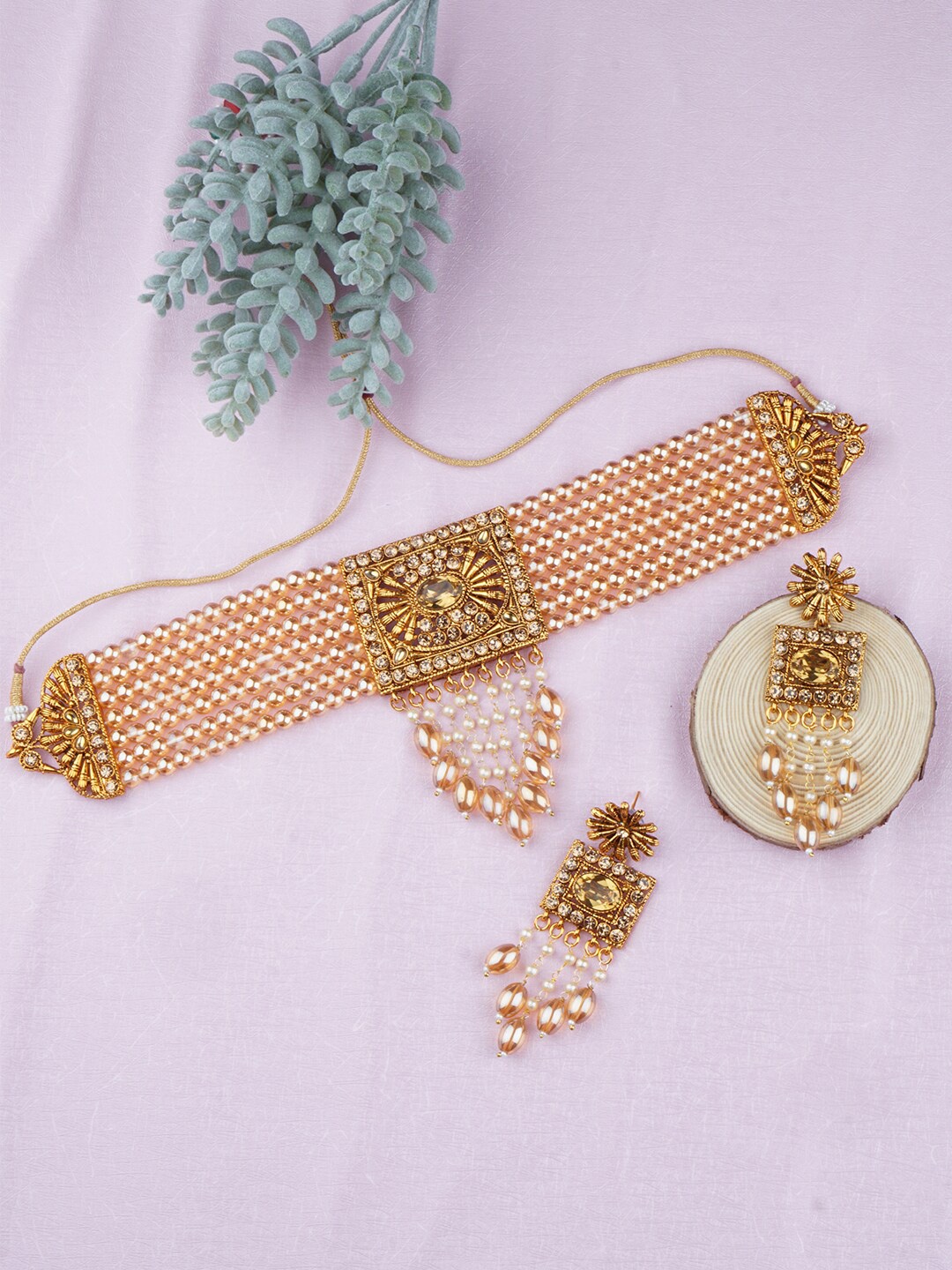 

Matushri Art Gold-Plated Stone-Studded & Beaded Jewellery Set