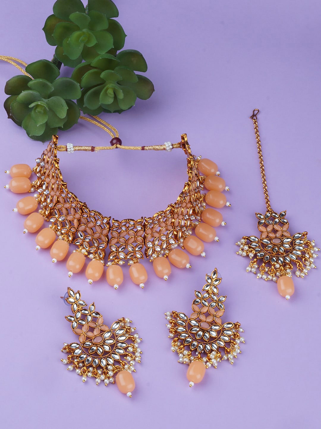 

Matushri Art Gold-Plated Kundan Studded & Beaded Jewellery Set