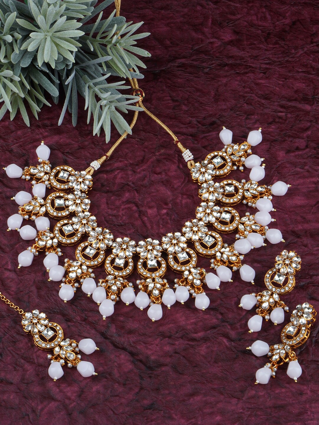 

Matushri Art Gold-Plated Kundan Studded & Beaded Jewellery Set