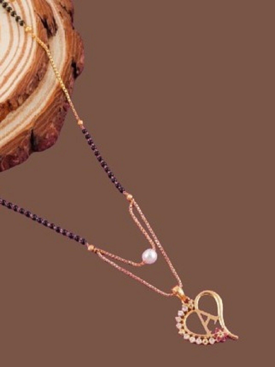 

JEWEL WORLD Gold-Plated Stone-Studded & Beaded Mangalsutra