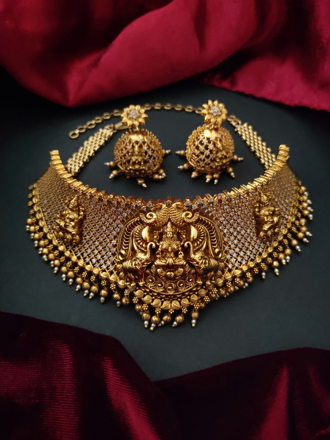 

Pihtara Jewels Gold-Plated Stone-Studded & Beaded Temple Jewellery Set