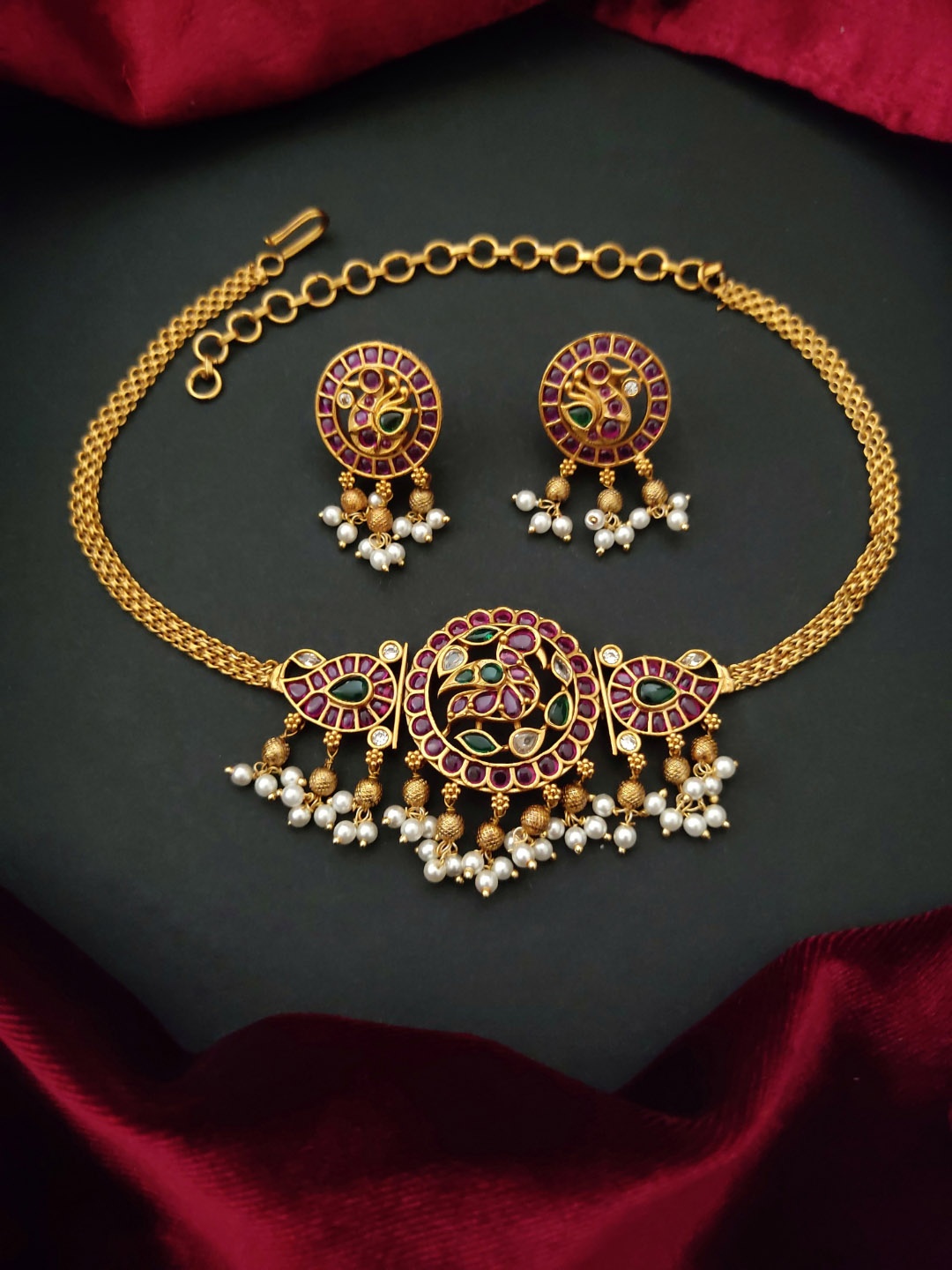 

Pihtara Jewels Gold-Plated Antique Stone Studded & Beaded Choker Jewellery Set