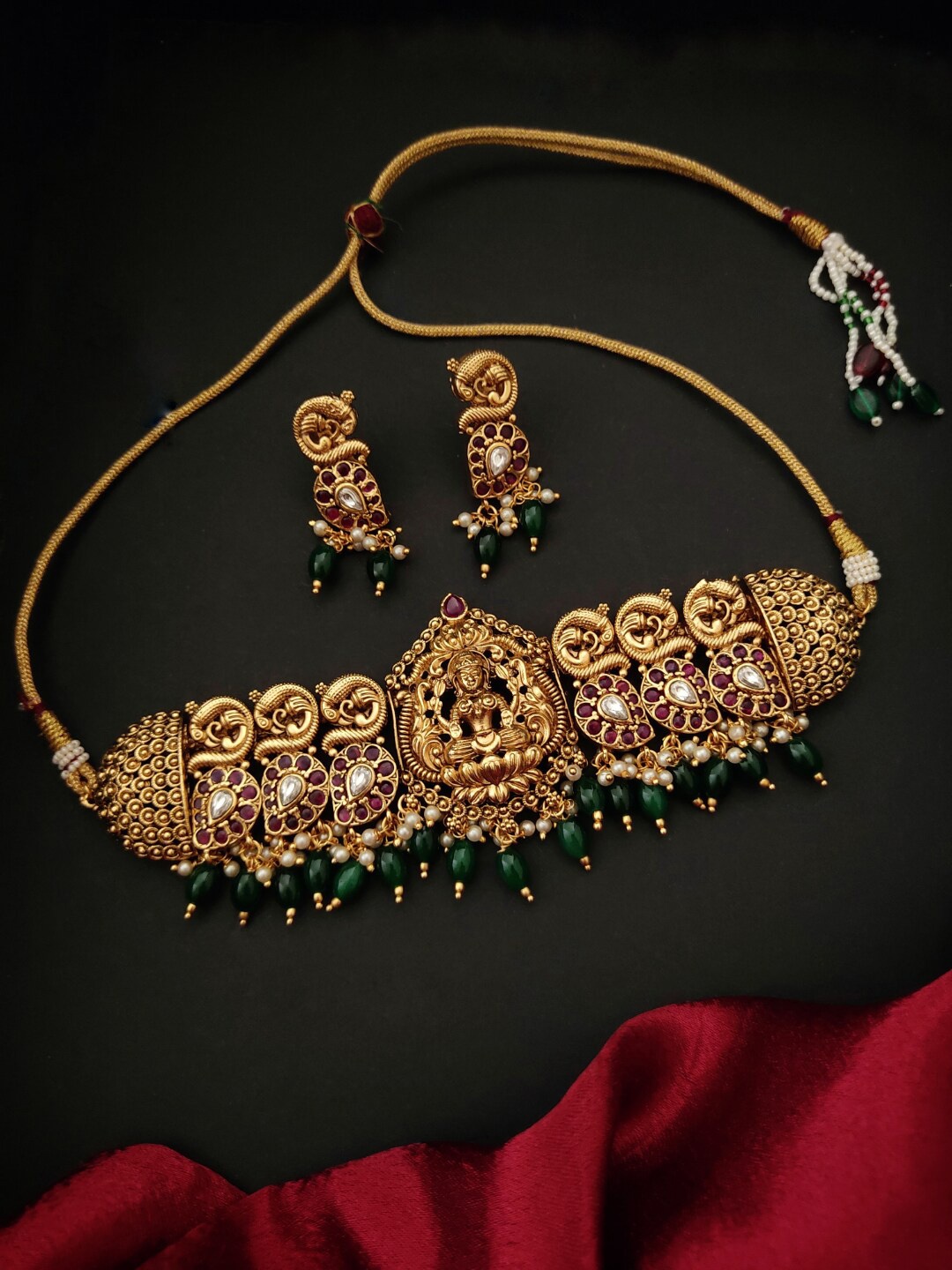 

Pihtara Jewels Gold-Plated Stone Studded & Beaded Jewellery Set