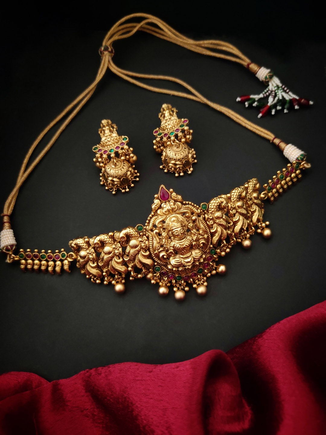 

Pihtara Jewels Gold-Plated Stone Studded Lakshmi Temple Choker Jewellery Set