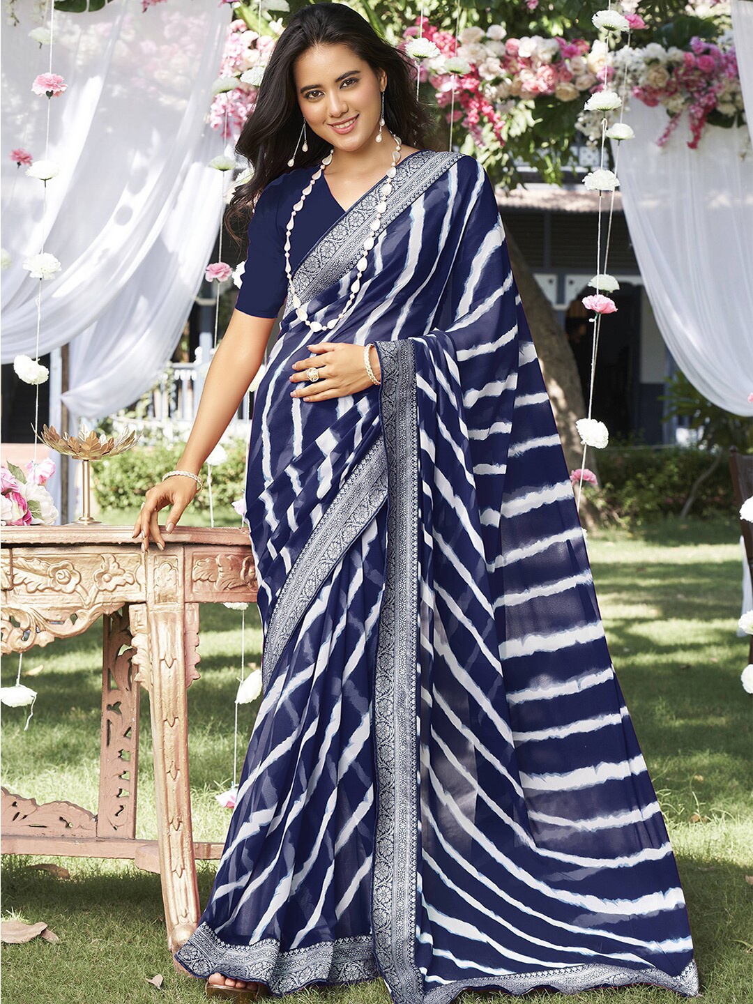 

Satrani Navy Blue & White Striped Zari Poly Georgette Saree