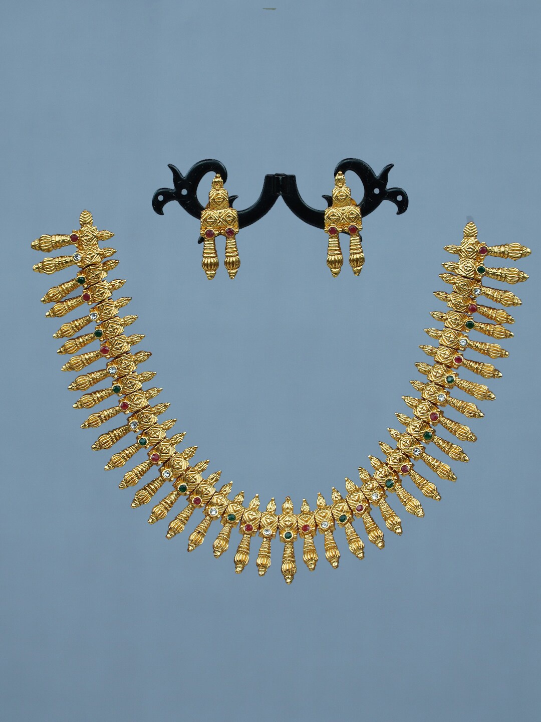 

Diksha collection Gold-Plated Stone Studded Jewellery Set