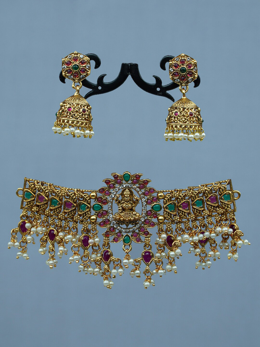 

Diksha collection Gold-Plated Stone-Studded & Beaded Jewellery Set
