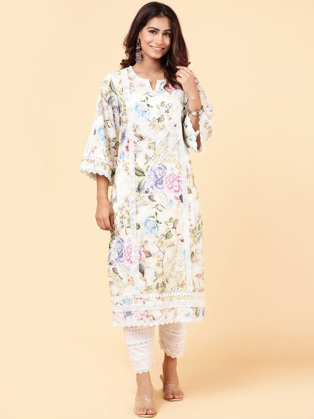 

Meena Bazaar Women White Floral Printed Regular Kurta with Trousers
