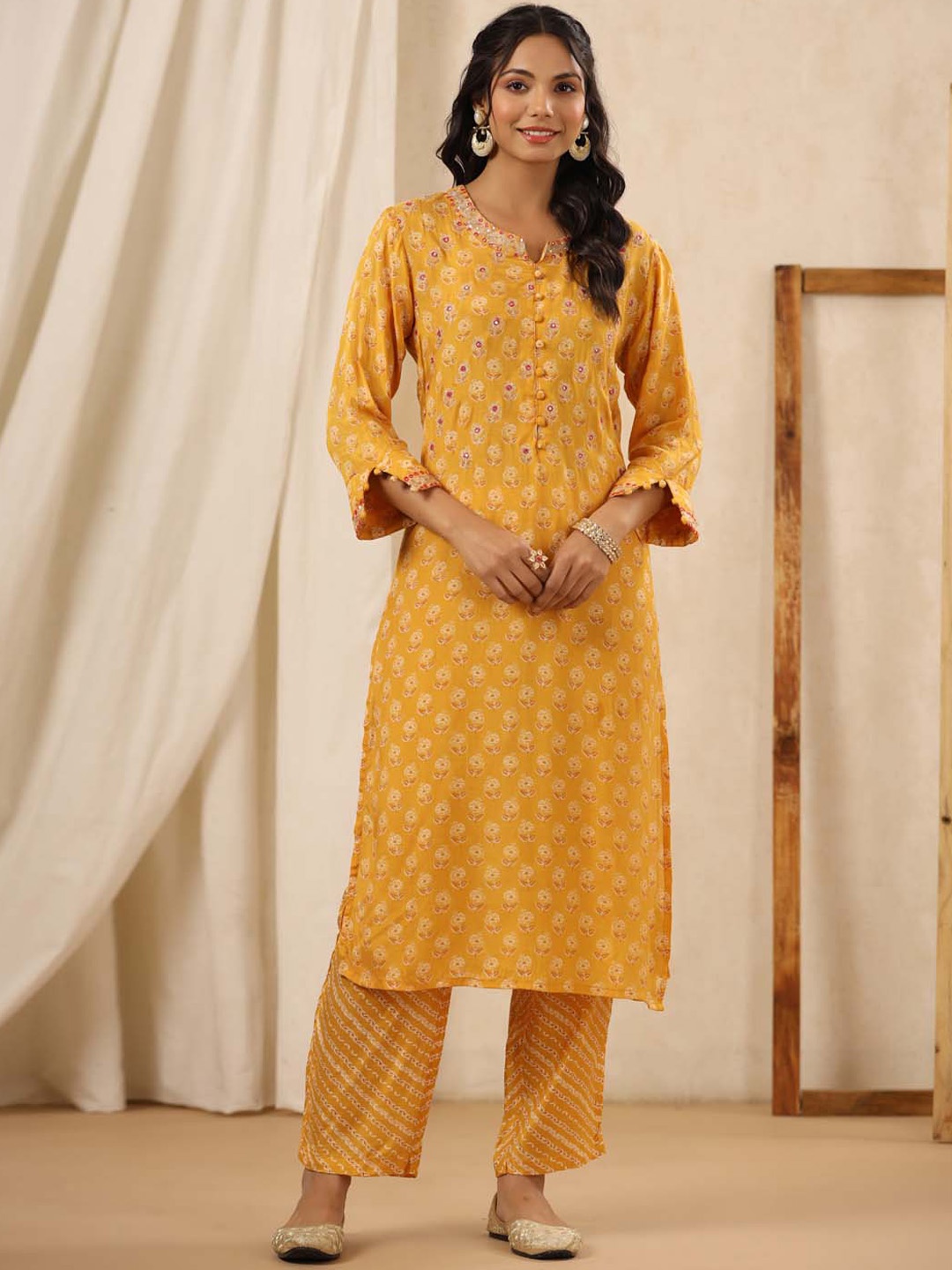 

Meena Bazaar Women Mustard Yellow Ethnic Motifs Printed Regular Kurta with Trousers