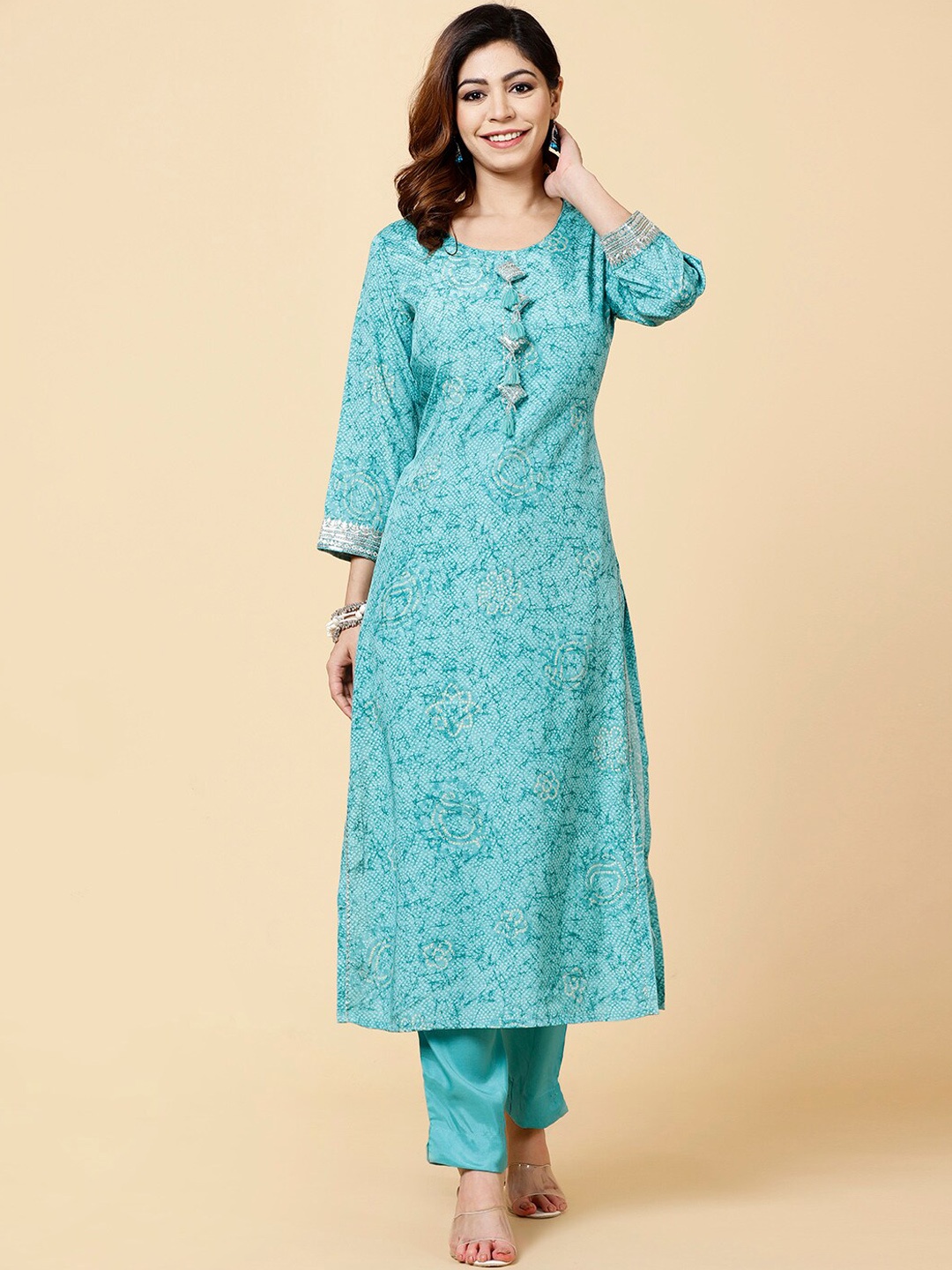 

Meena Bazaar Women Blue Printed Regular Kurta with Trousers