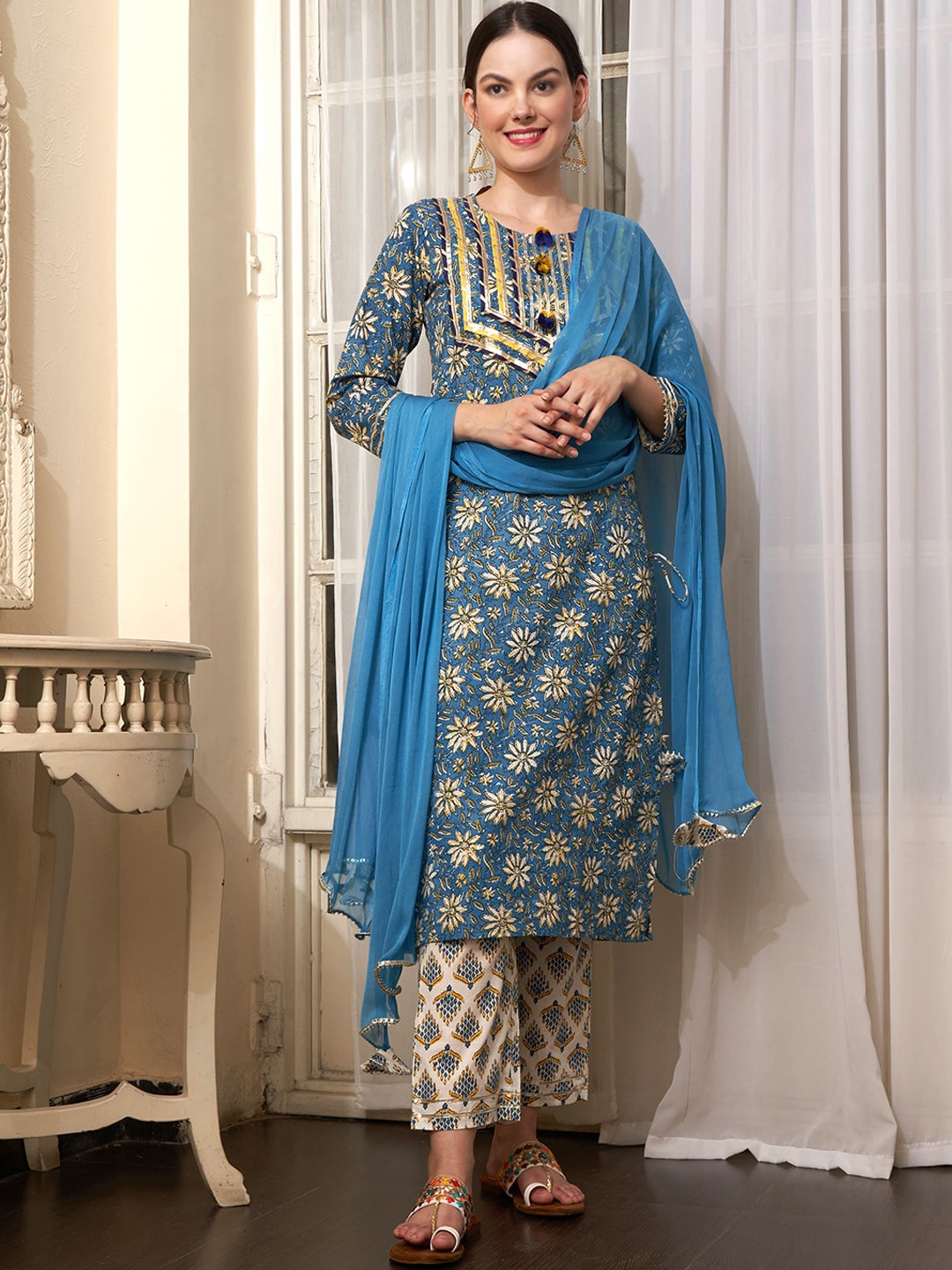 

Sangria Blue Ethnic Motifs Printed Cotton Kurta with Trousers & Dupatta