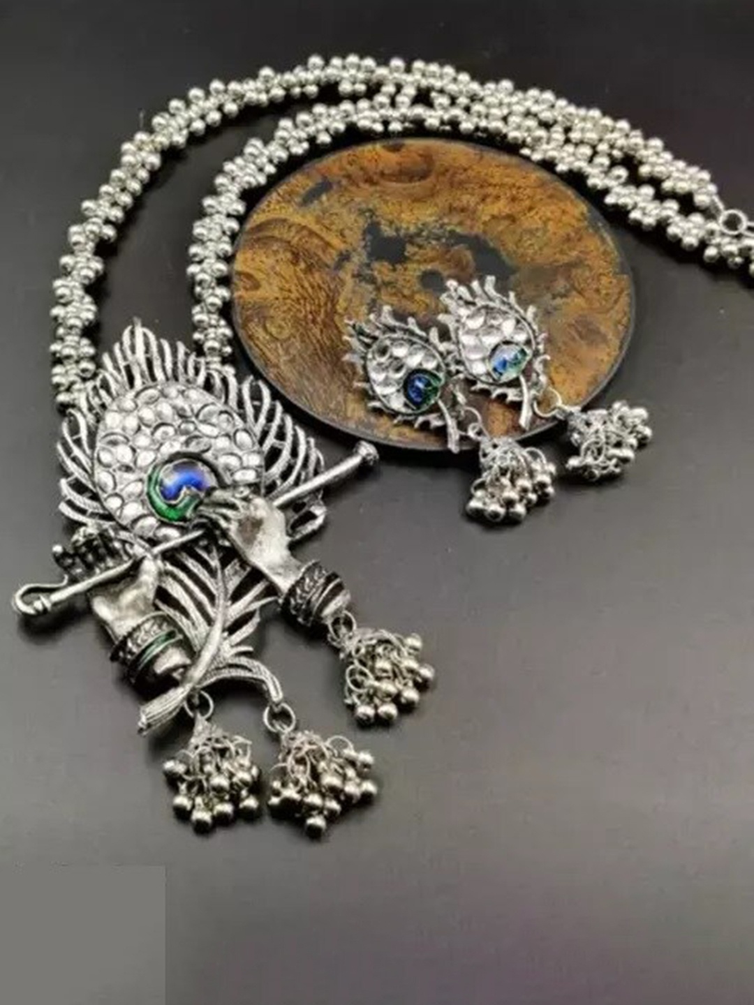 

Samridhi DC Silver-Plated Earrings With Necklace