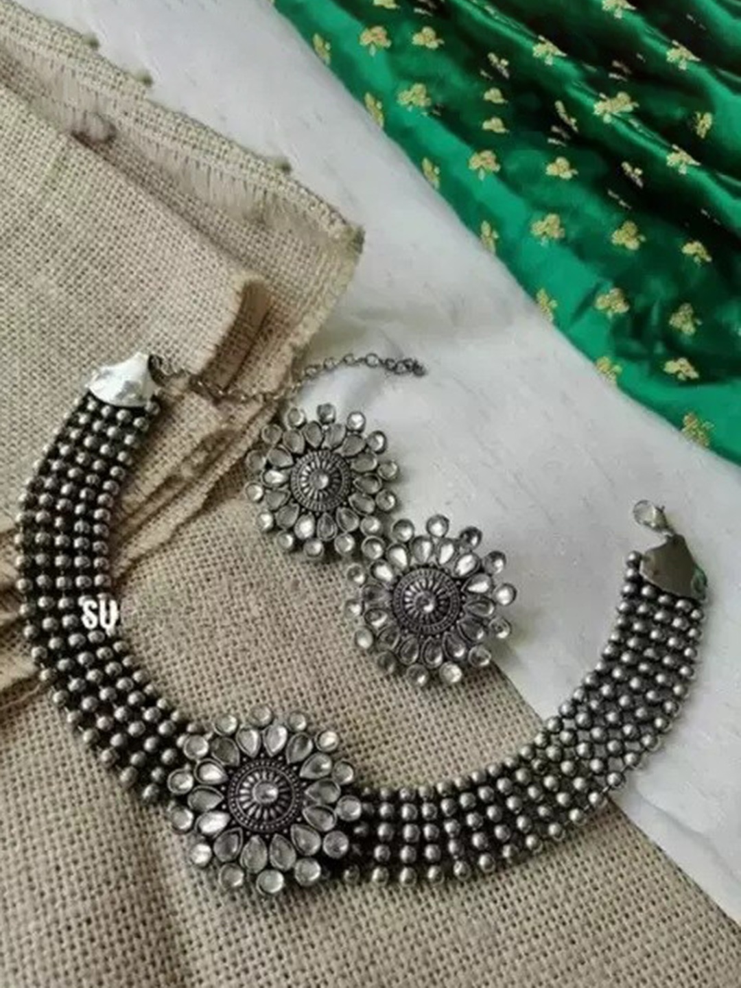 

Samridhi DC Oxidised Silver-Plated Jewellery Set