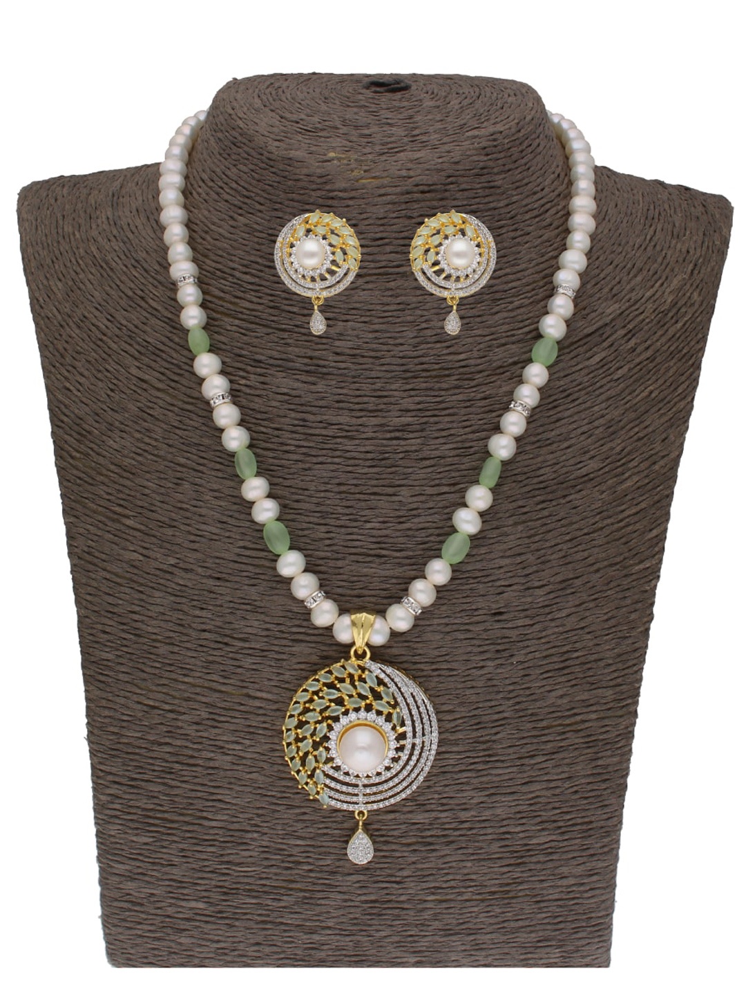 

Sri Jagdamba Pearls Dealer Gold-Plated Stone Studded & Beaded Jewellery Set
