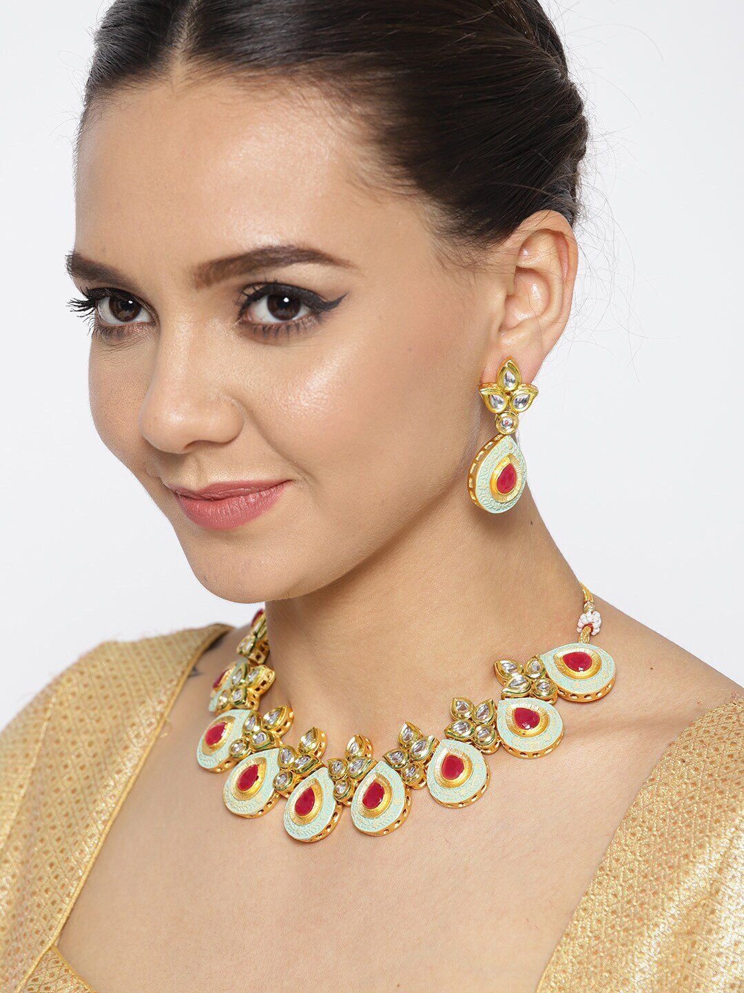 

Anouk Gold-Plated Sea Green Stone Studded Enamelled Necklace & Earring