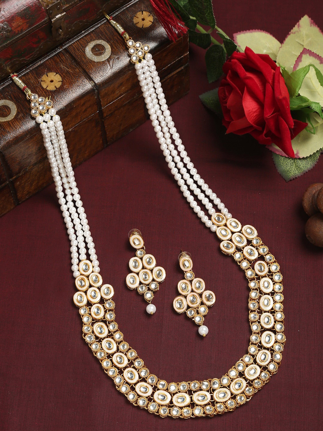 

Anouk Gold-Plated & White Kundan Studded & Beaded Necklace & Earrings