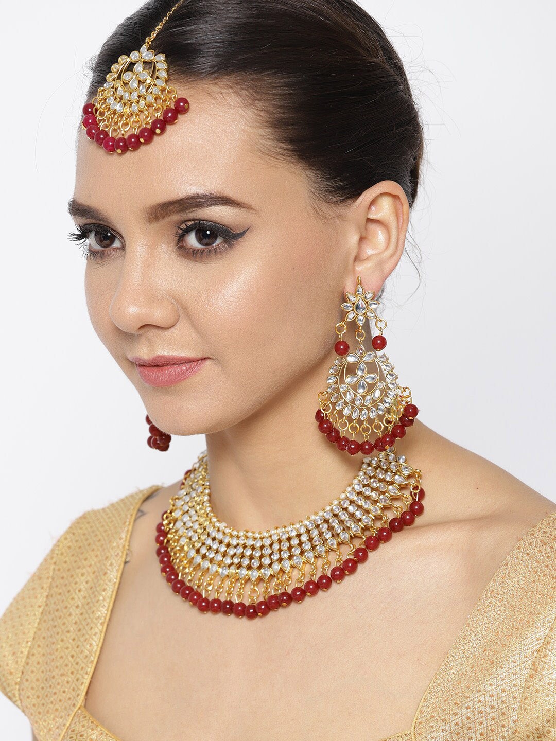 

Anouk Gold-Plated & Red Stone Studded & Beaded Necklace & Earrings With Maang Tika