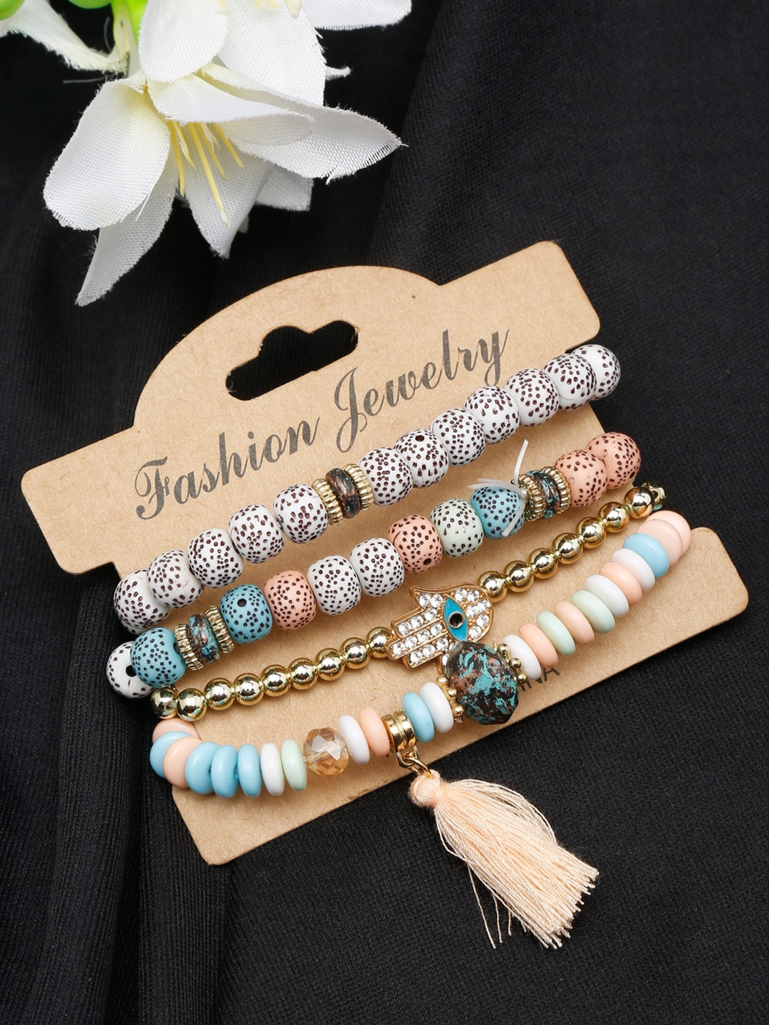 

DressBerry Women Set Of 4 White & Blue Beaded Bracelet