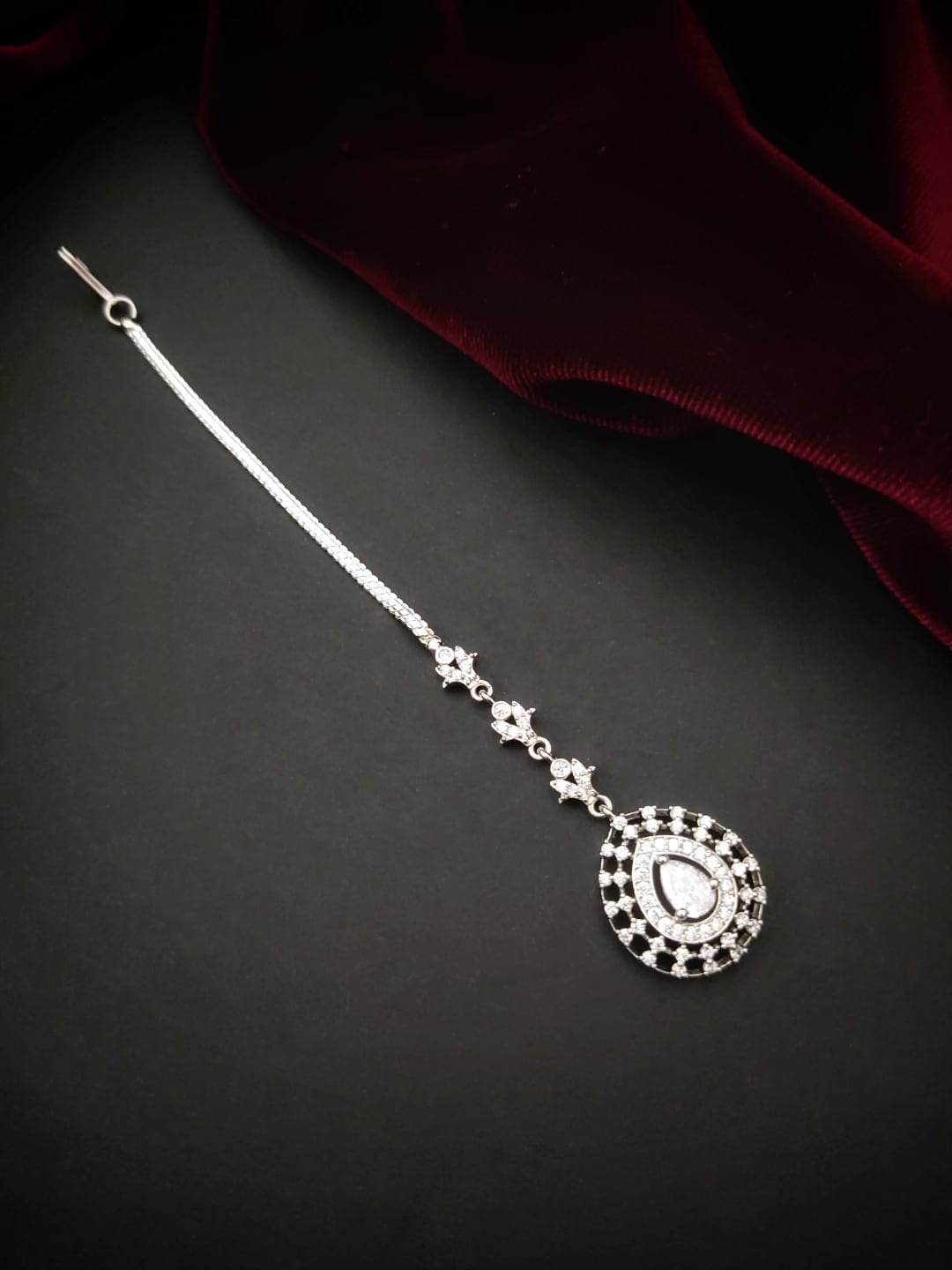 

Pihtara Jewels Silver-Plated AD Studded Maang Tikka