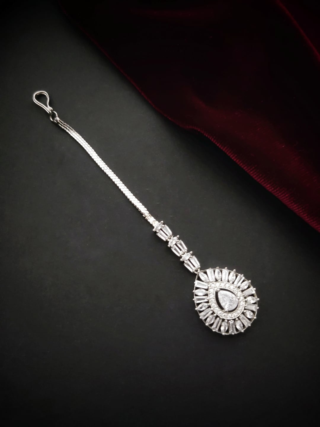 

Pihtara Jewels Silver-Plated AD Studded Maangtikka