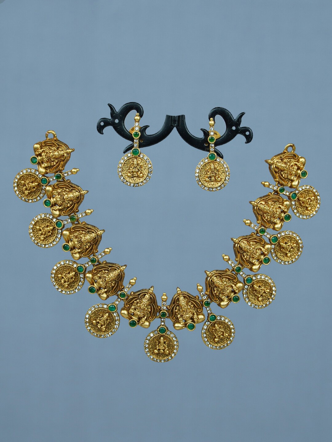 

Diksha collection Gold-Plated Stone Studded Temple Jewellery Set