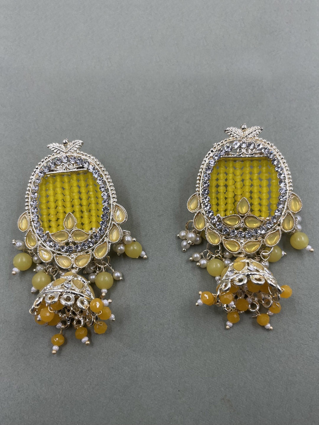 

Rhymee Gold Plated Pearls Studded Dome Shaped Jhumkas