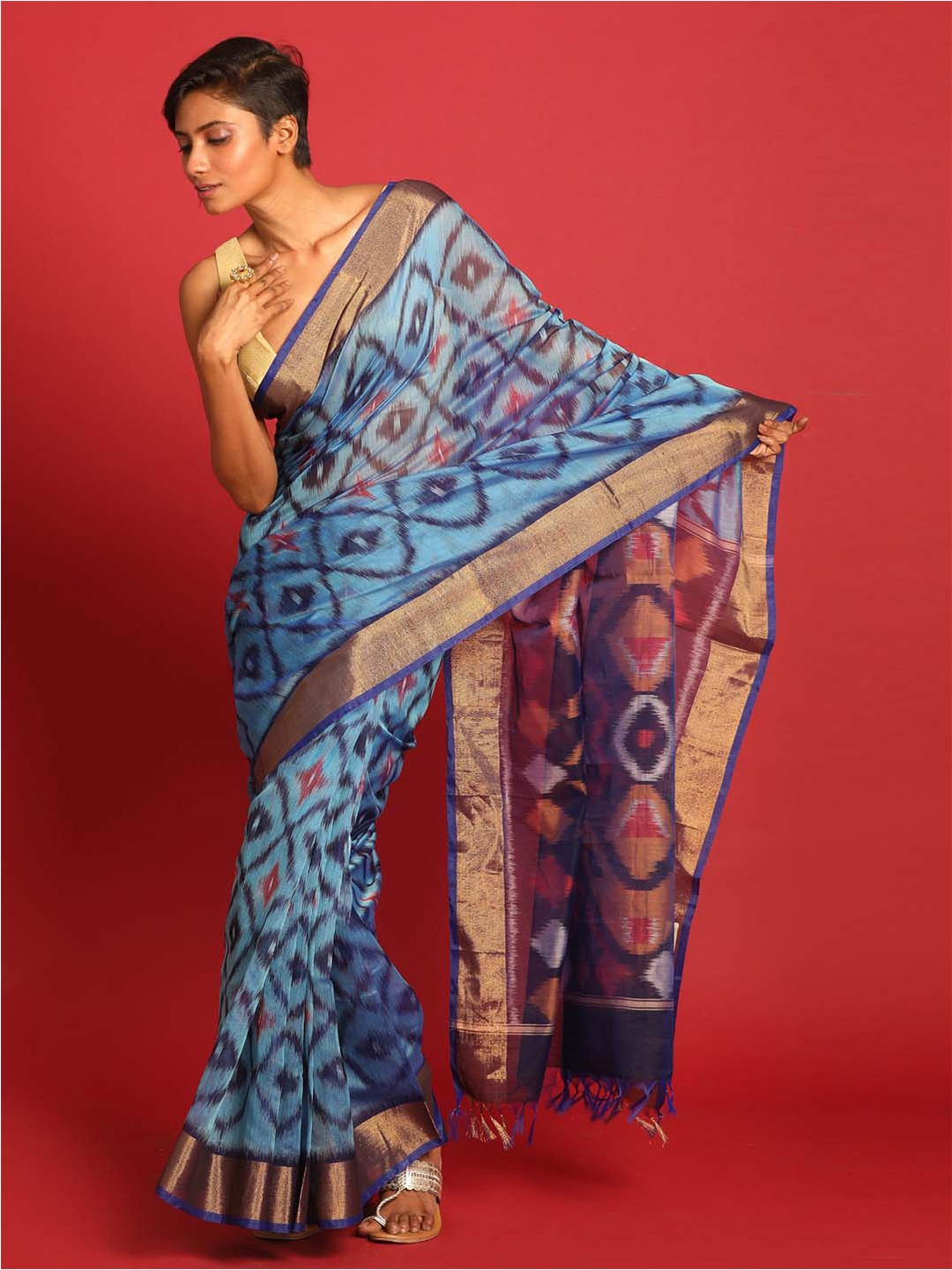 

Indethnic Geometric Woven Design Zari Pochampally Saree, Blue