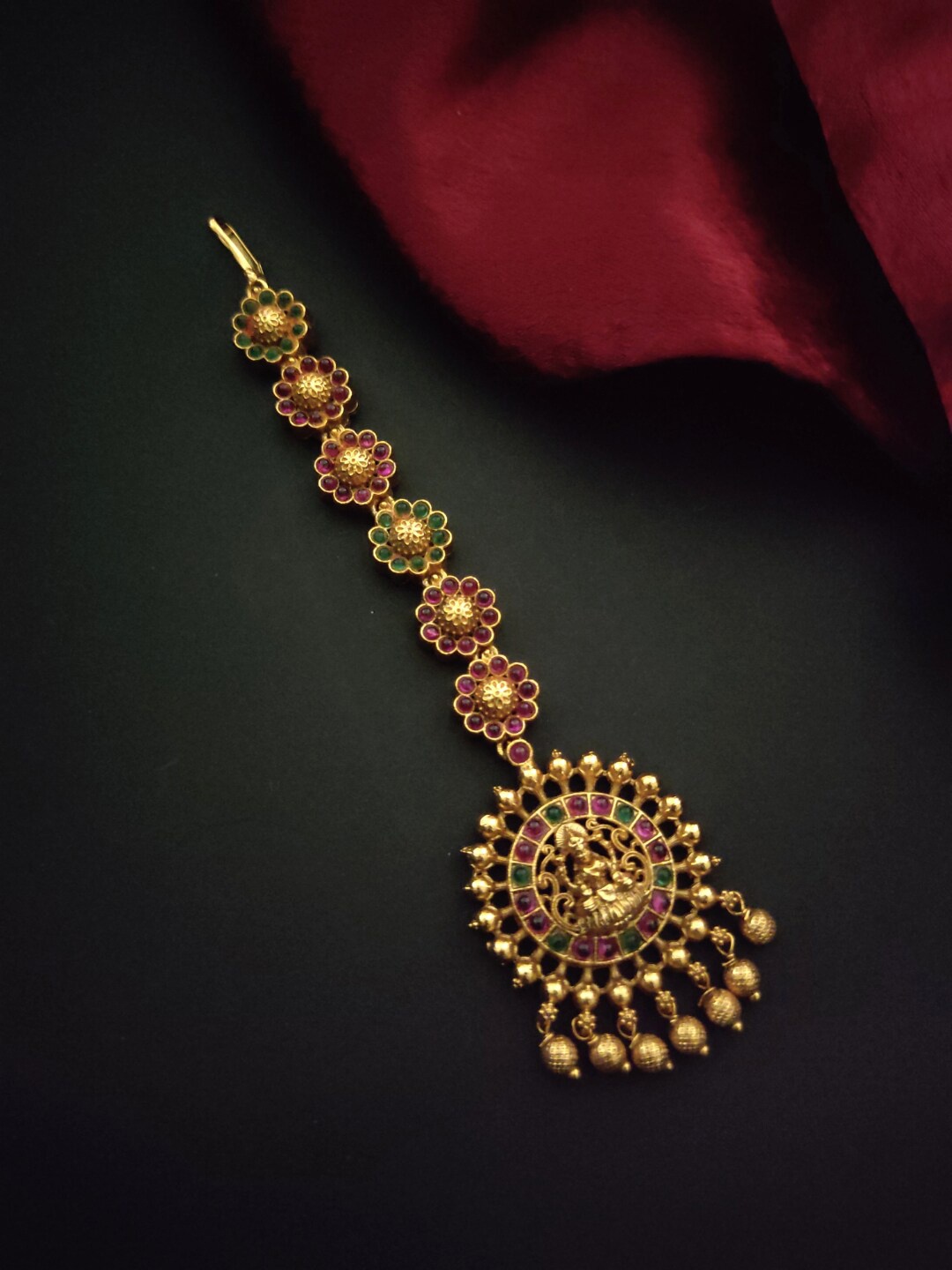 

Pihtara Jewels Gold-Plated Green & Pink Stone-Studded & Beaded Lakshmi Maang Tikka