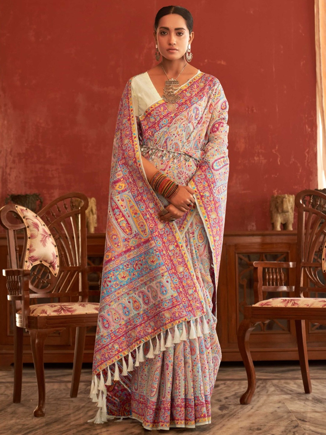 

Mitera White & Purple Embellished Zari Silk Blend Saree