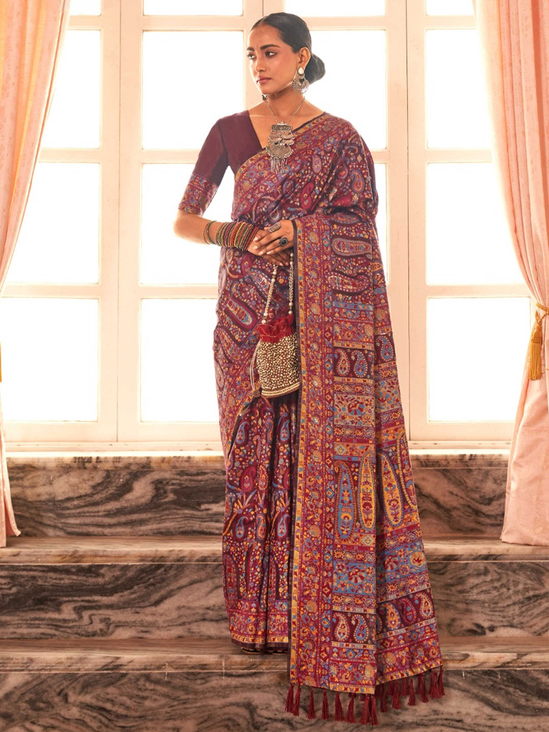 

Mitera Purple & Mustard Paisley Silk Blend Saree