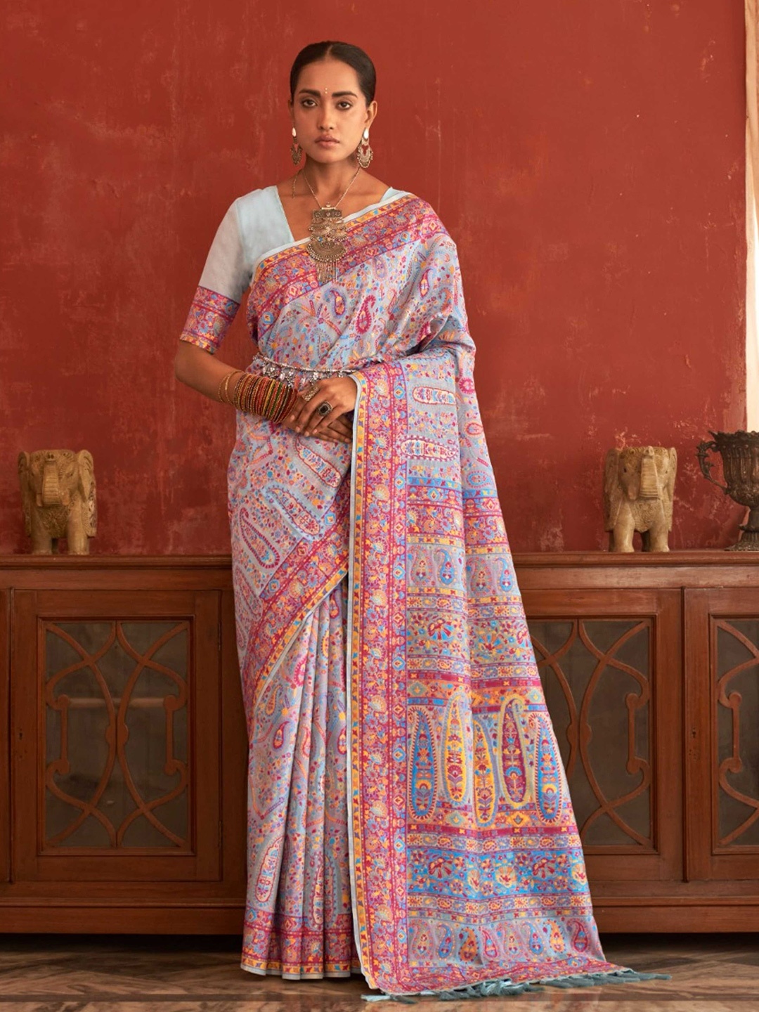 

Mitera Blue Paisley Woven Design Saree