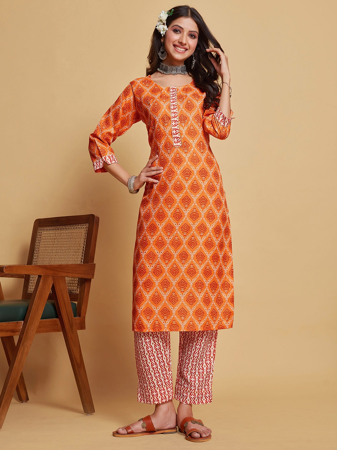 

Sangria Orange Ethnic Motifs Printed Linen Printed Straight Kurta With Trouser