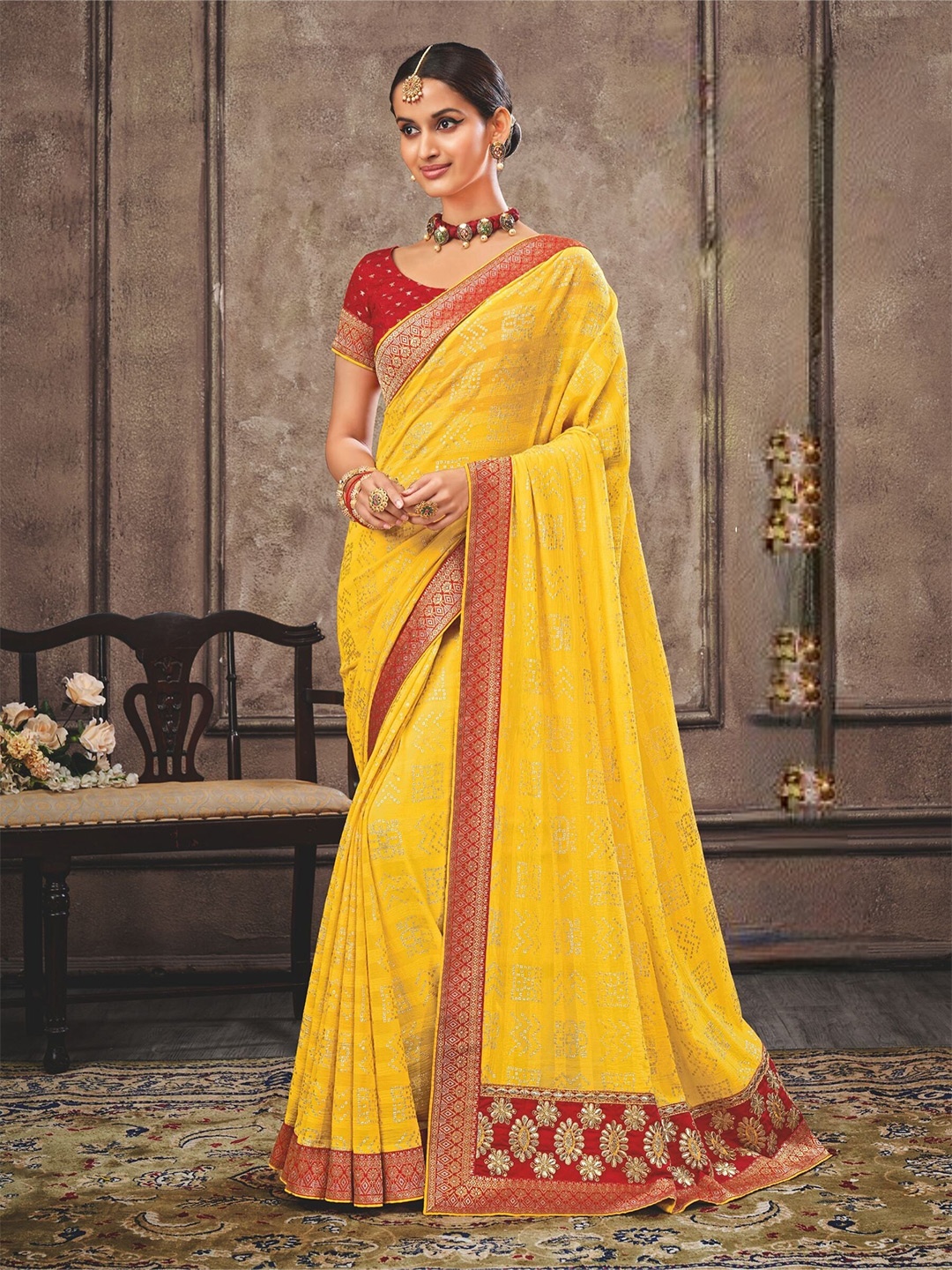 

Laxmipati Yellow & Red Zari Poly Chiffon Saree