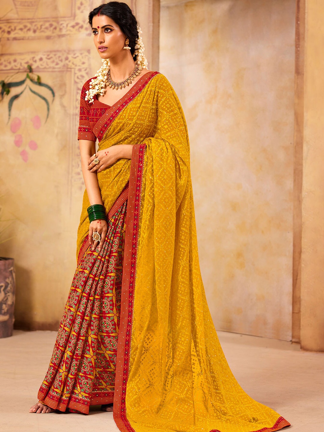 

Laxmipati Ethnic Motifs Printed Brasso Saree, Mustard