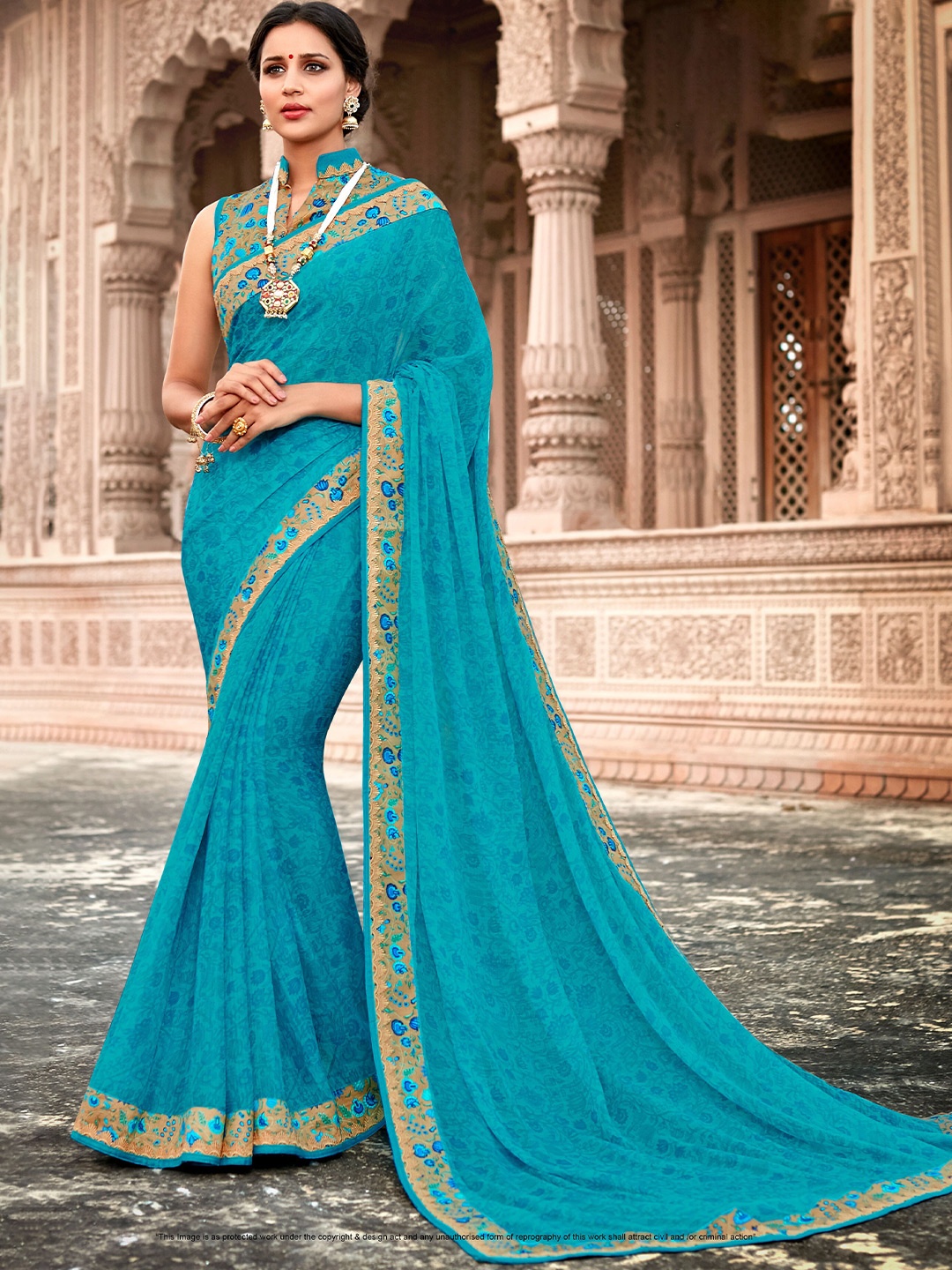 

Laxmipati Ethnic Motifs Printed Poly Chiffon Saree, Blue