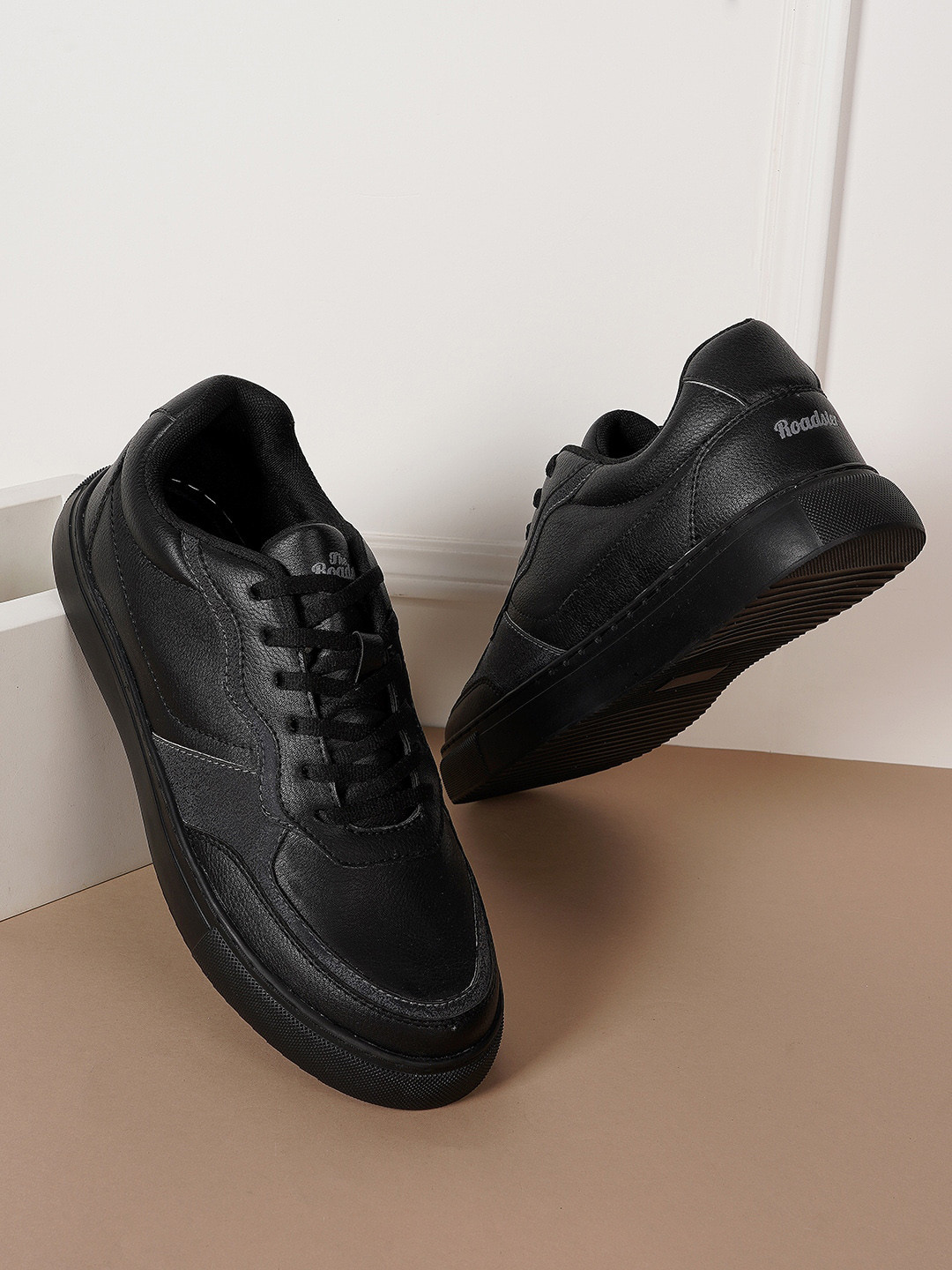 

The Roadster Lifestyle Co. Men Black Textured Custom Orthotics Sneakers