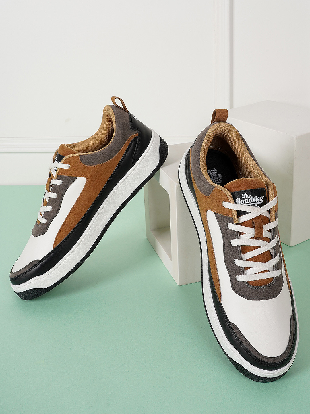 

The Roadster Lifestyle Co. Men White And Brown Colourblocked Custom Orthotics Sneakers