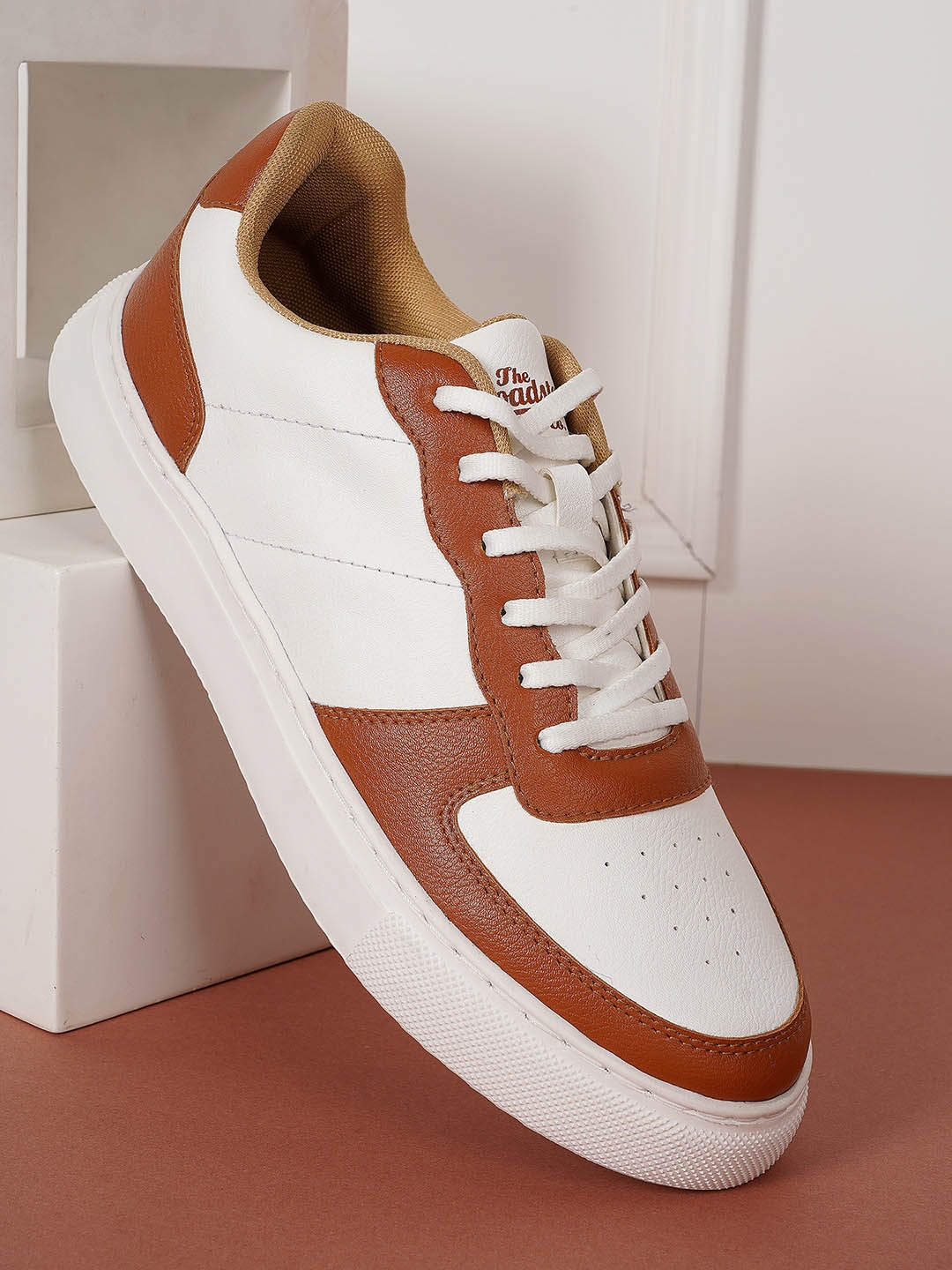 

The Roadster Lifestyle Co. Men White And Brown Colourblocked Custom Orthotics Sneakers