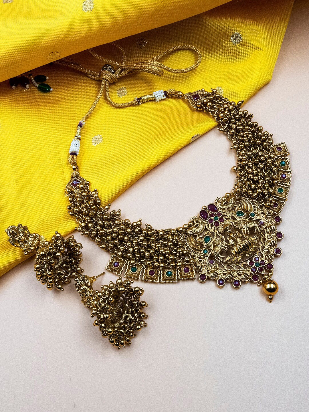 

StileAdda Gold-Plated Crystal Studded & Beaded Temple Jewellery Set