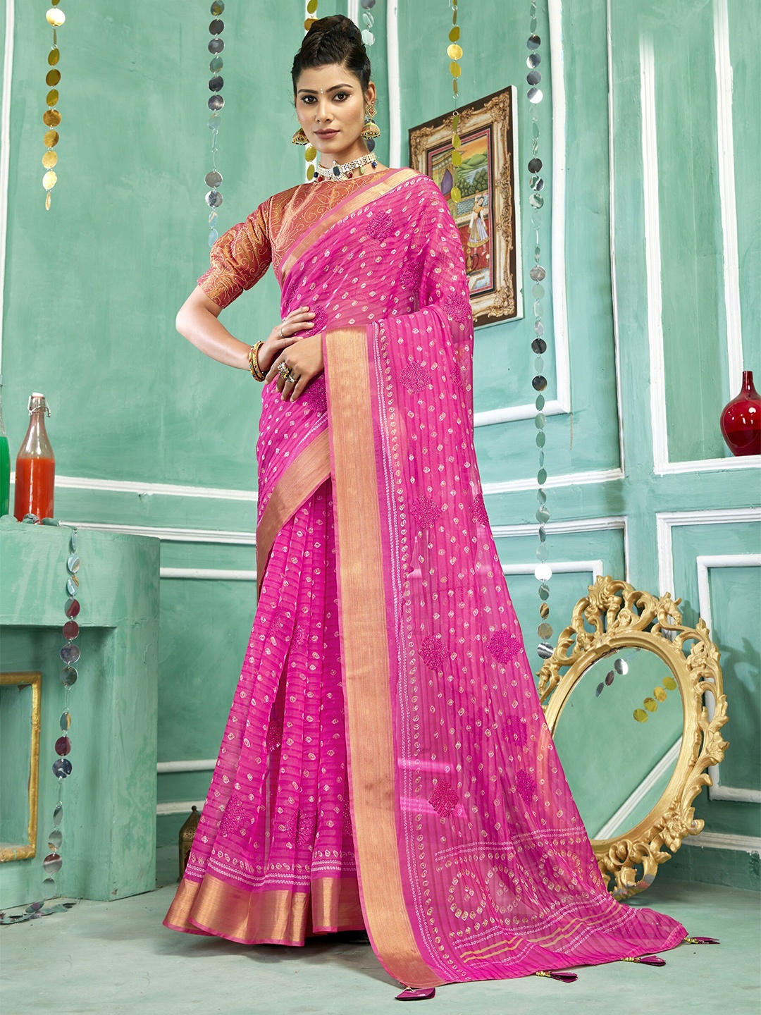 

Triveni Ethnic Motifs Embroidered Zari Pure Georgette Saree, Pink